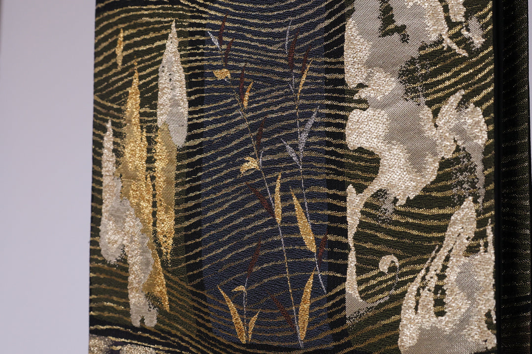 HERONS ALONG THE FLOWING STREAM